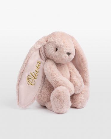 Rosa kanin med navn i gull broderi