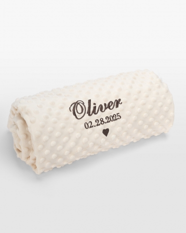 Kremfarget babyteppe med brun broderi