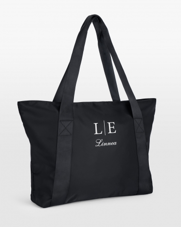Romslig treningsbag med navn