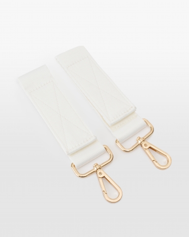 Kremfargede barnevognskroker til å feste på stellevesken med navn