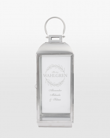 Sølvfarget lyslykt med navn