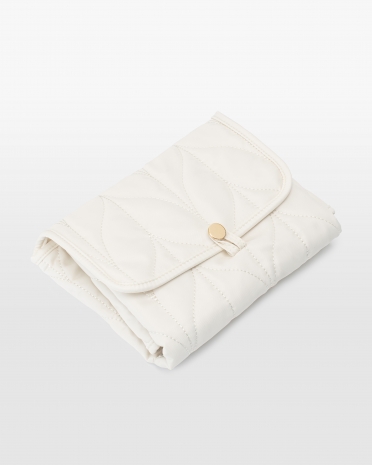 Smidig stelleunderlag i kremfarge