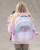 Glitrende, skimrende ryggsekk til skolebarn