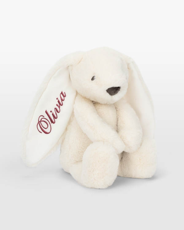 Kremfarget kanin med mørkerosa broderi