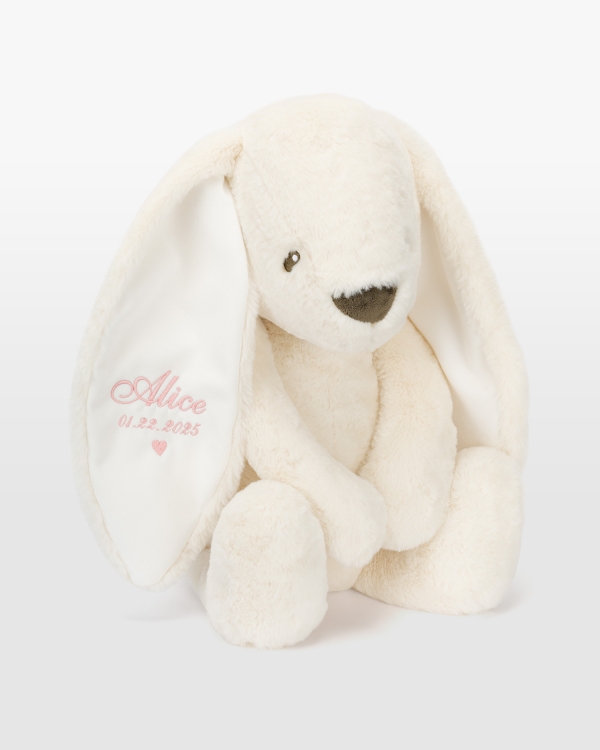 Kremfarget kanin med rosa broderi