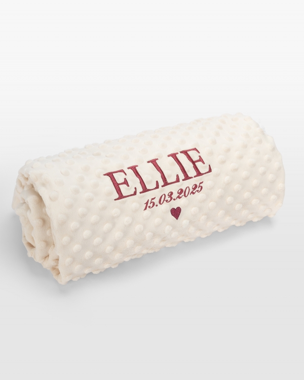 Kremfarget babyteppe med mørkerosa broderi