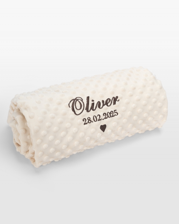 Kremfarget babyteppe med brun broderi