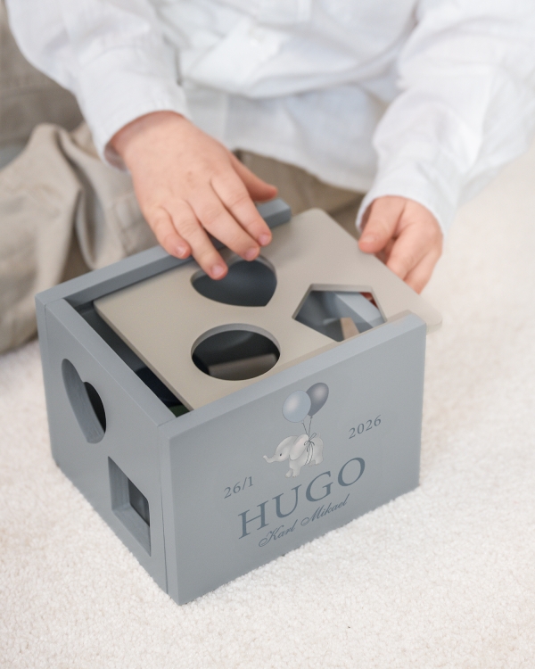 Plukkeboks med klosser og personlig merking