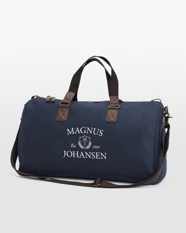 Marineblå veske med navn for herrer