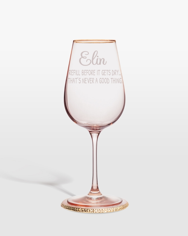 Rosa vinglass som kommer personlig merket