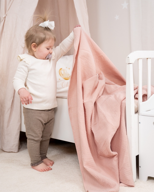 Vaaleanpunainen musliiniviltti