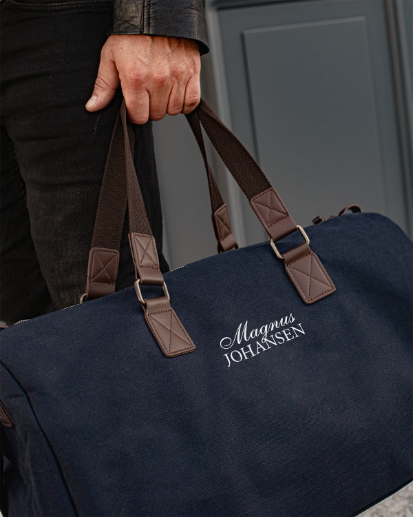 Marinblå duffle bag med namn i set Marineblå duffelbag med navn i sett