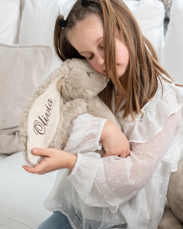 Kosekanin med brodert navn